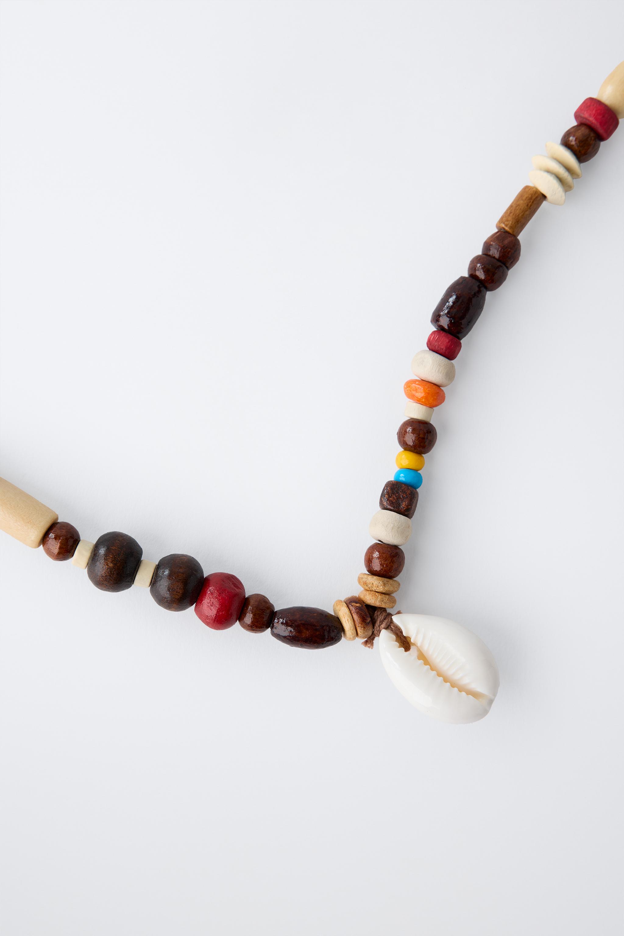 COLLIER FANTAISIE ET COQUILLAGE